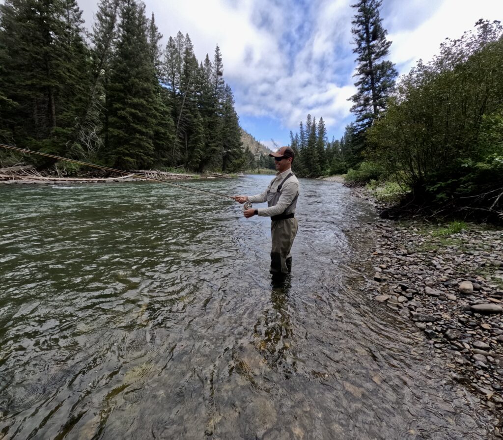 tourist fly fishing on the gallatin river with gallatin river guides