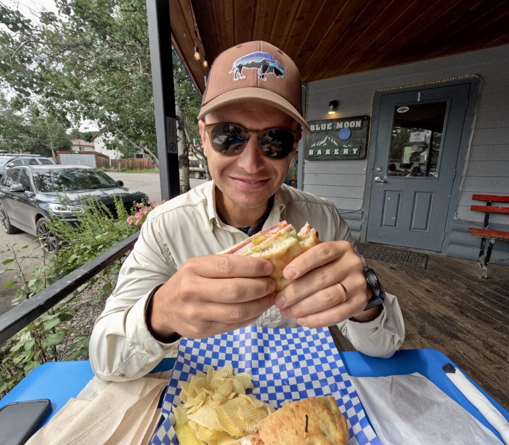 tourist eating at blue mountain bakery in big sky montana