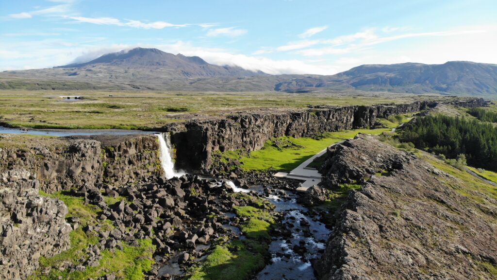 tourist drone image of oaxarfoss falls in thingvellir park along golden circle iceland